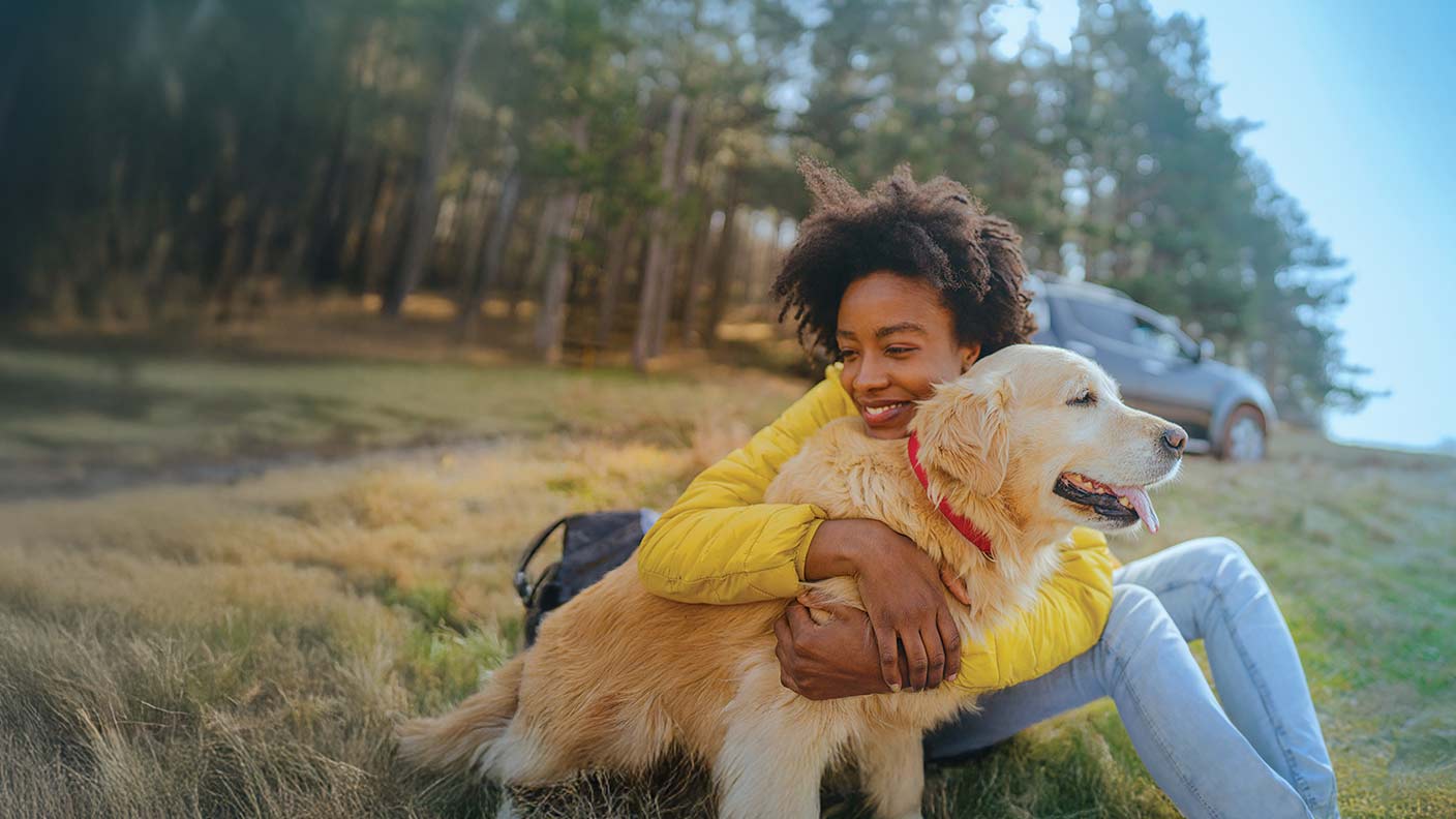 Person hugging dog Person hugging dog