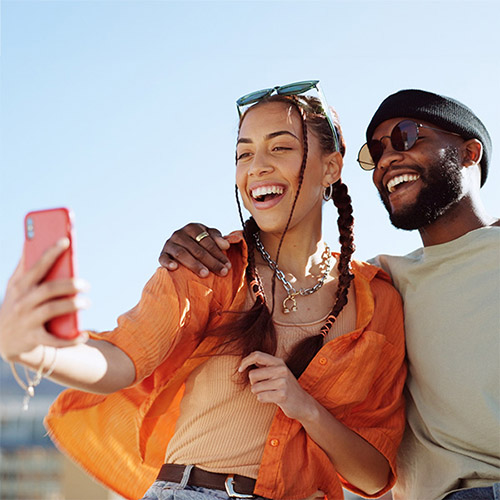 Couple looking at a mobile phone